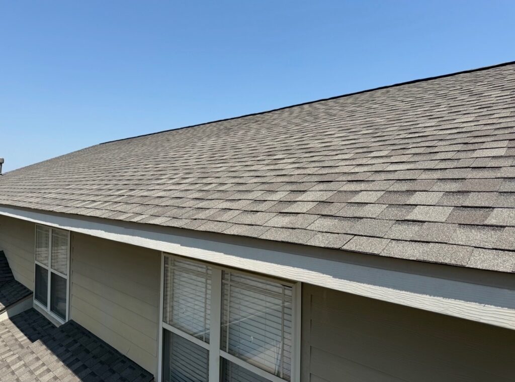 A newly repaired shingle roof from a home serviced by RoofCo NWA in Fayetteville AR.