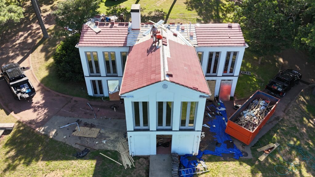 Photo of a tile roof replacement in Farmington AR courtesy of RoofCo NWA.